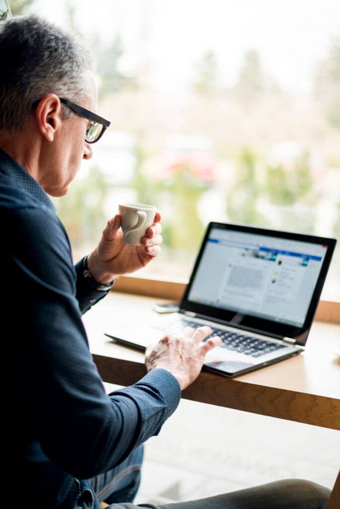 A businessman working on LinkedIn platform for his business